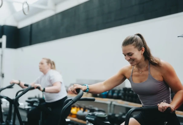 Woman riding gym bike